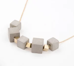 Gold cubes and grey concrete