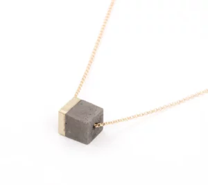 Dark gray concrete and golden brass (small)