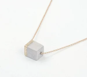 Light gray concrete and golden brass (small)