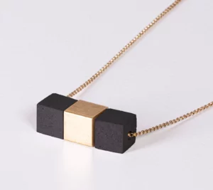 Structured concrete black cubes & brass